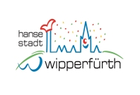 Das Bild zeigt das Logo der Stadt mit Konfetti.